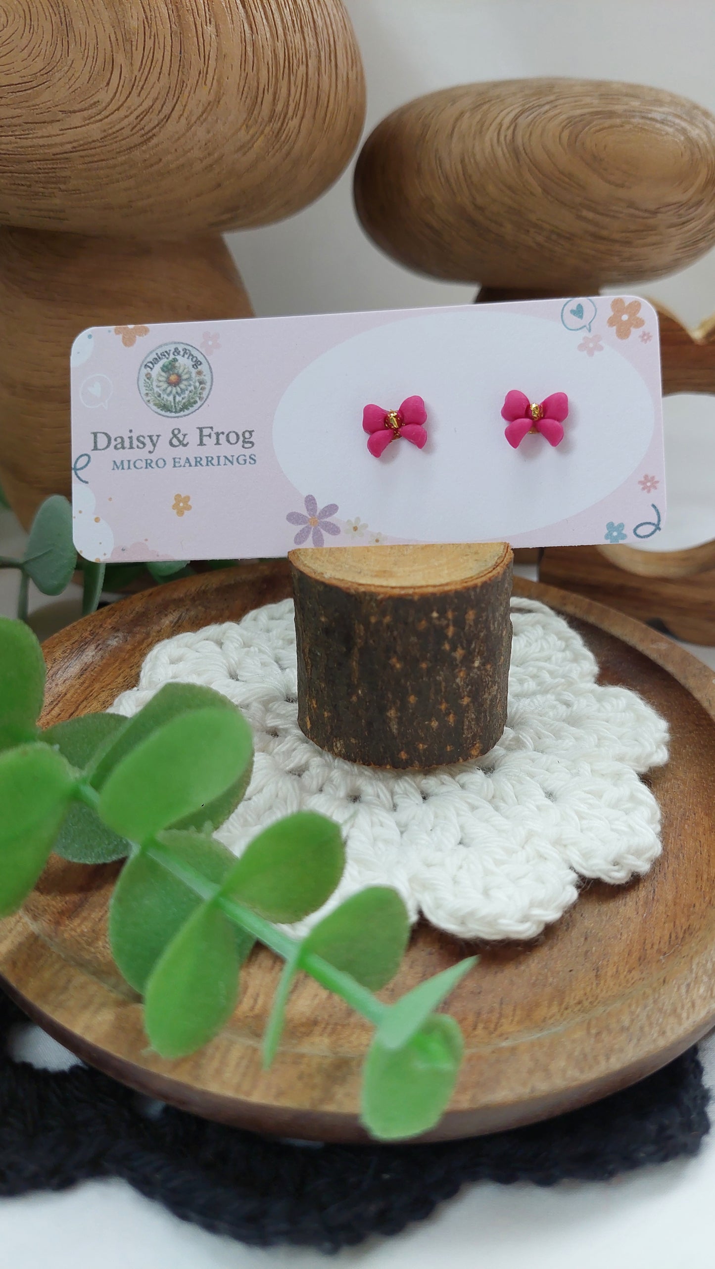 Micro bow stud earrings