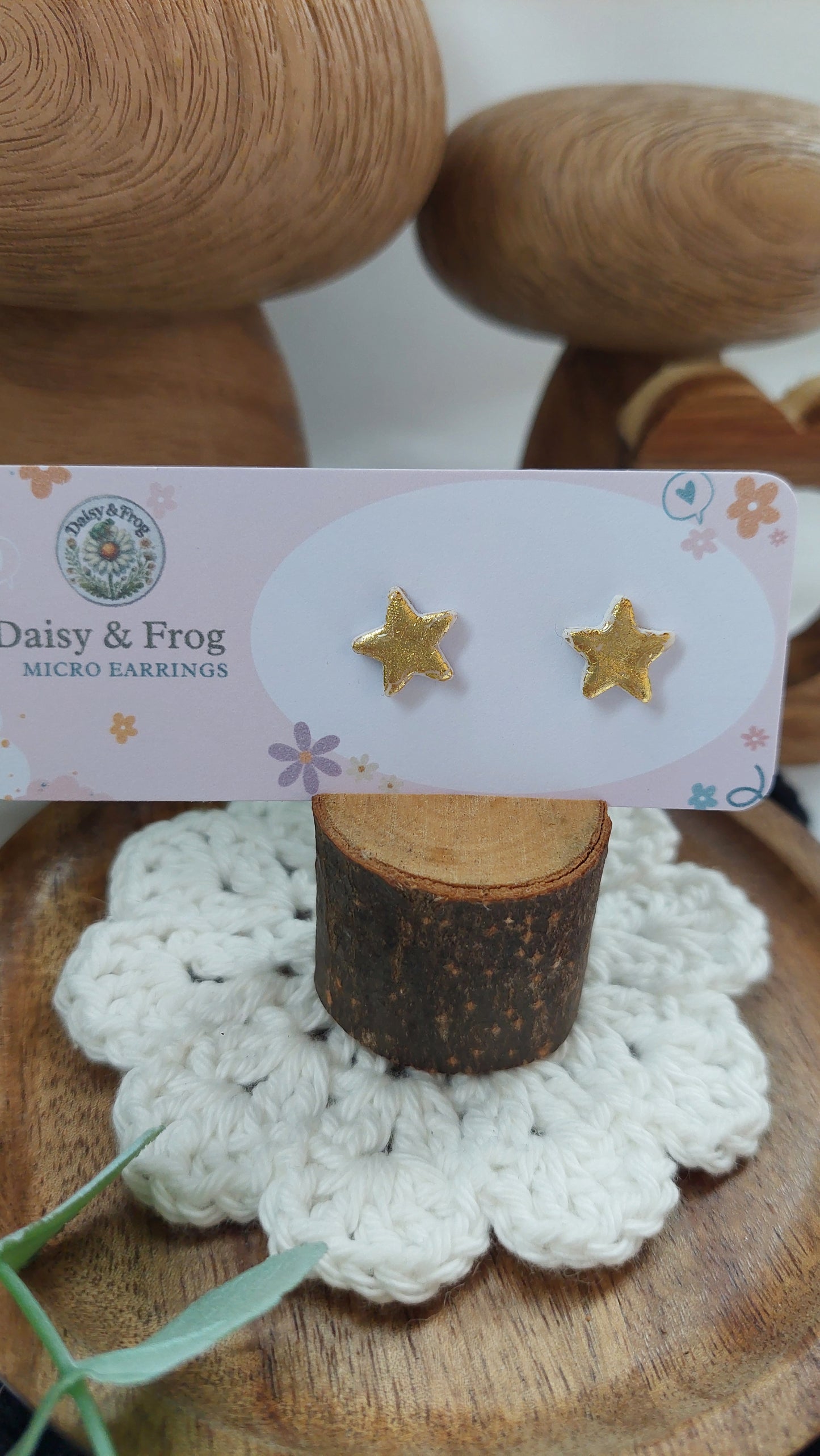 Mini gold star earrings