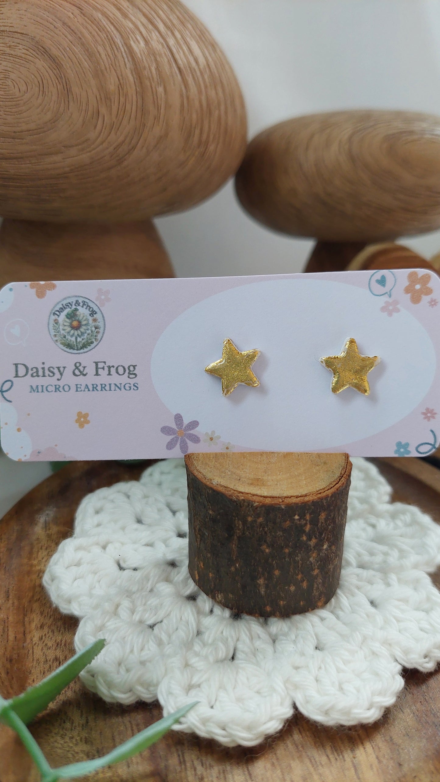 Mini gold star earrings